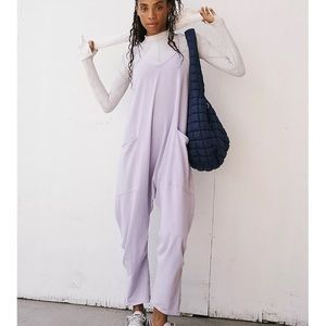 Never worn free people hot shot onesie size xs